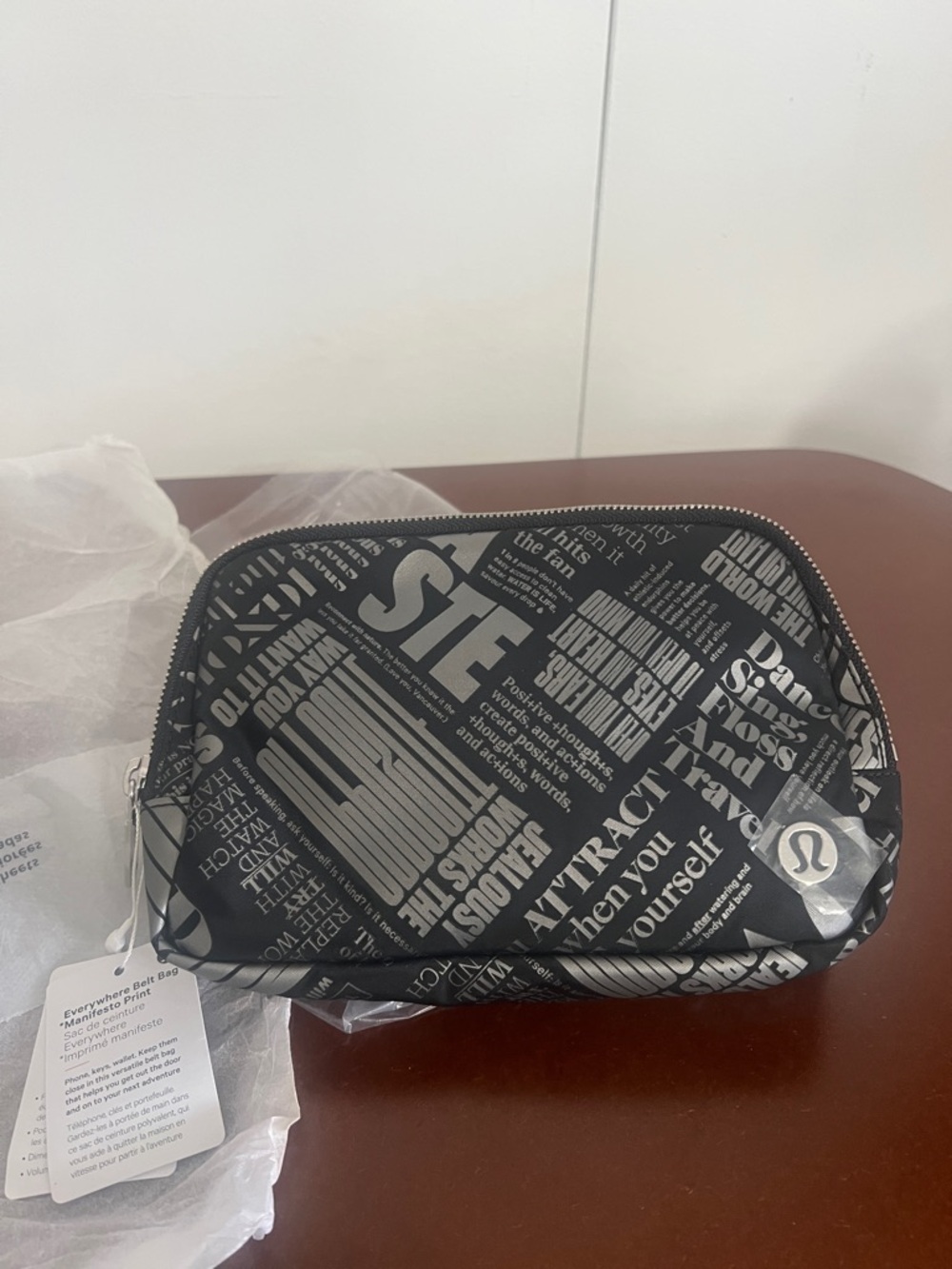 lululemon athletica Black & White Newspaper Print Pouch